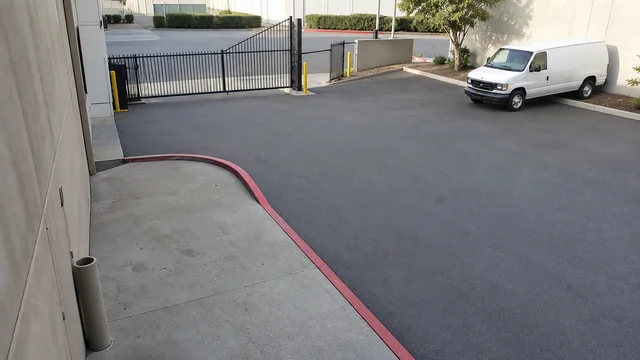 The same generated warehouse entrance recording without the timestamp and camera identifier