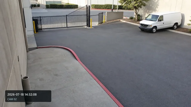 Generated private warehouse entrance recording with a fictional timestamp and CAM 02 identifier
